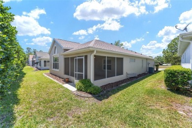 You'll love this beautiful, concrete block stucco home with so on Royal Oaks Golf Club in Florida - for sale on GolfHomes.com, golf home, golf lot