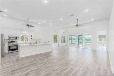 NEW ROOF! Welcome home to your 3 bedroom, 3.5 bath and 3 car on Santa Lucia River Club in Florida - for sale on GolfHomes.com, golf home, golf lot