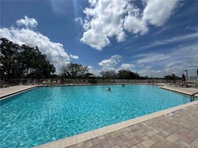 Move-in ready two-bedroom, two-bath home offering an open floor on Heritage Pines Country Club in Florida - for sale on GolfHomes.com, golf home, golf lot