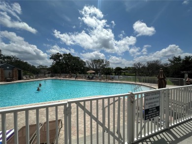 Move-in ready two-bedroom, two-bath home offering an open floor on Heritage Pines Country Club in Florida - for sale on GolfHomes.com, golf home, golf lot