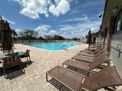 Move-in ready two-bedroom, two-bath home offering an open floor on Heritage Pines Country Club in Florida - for sale on GolfHomes.com, golf home, golf lot