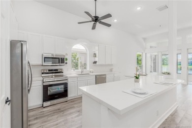 NEW ROOF! Welcome home to your 3 bedroom, 3.5 bath and 3 car on Santa Lucia River Club in Florida - for sale on GolfHomes.com, golf home, golf lot