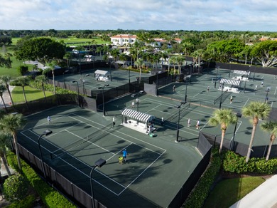 PRICED TO SELL WITH A NEW ROOF! WELCOME TO YOUR SANCTUARY IN THE on PGA National Estates Golf Course in Florida - for sale on GolfHomes.com, golf home, golf lot