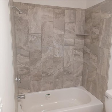 NEW - 2BDR 2BA 1/2 Duplex home. *NO HOA* Be the first to live in on Bay Tree Golf Course in Florida - for sale on GolfHomes.com, golf home, golf lot