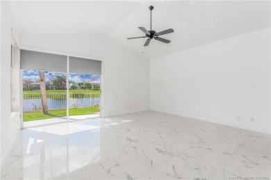 NEW ROOF! Welcome home to your 3 bedroom, 3.5 bath and 3 car on Santa Lucia River Club in Florida - for sale on GolfHomes.com, golf home, golf lot