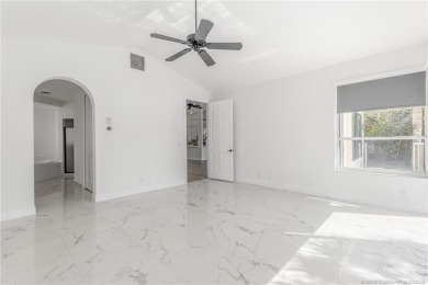 NEW ROOF! Welcome home to your 3 bedroom, 3.5 bath and 3 car on Santa Lucia River Club in Florida - for sale on GolfHomes.com, golf home, golf lot