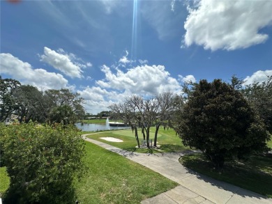 Move-in ready two-bedroom, two-bath home offering an open floor on Heritage Pines Country Club in Florida - for sale on GolfHomes.com, golf home, golf lot