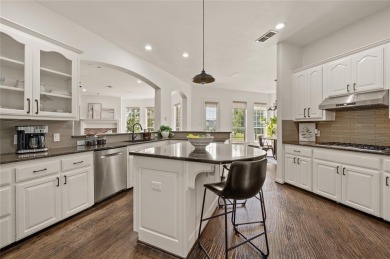 Welcome to this exquisite property! Nestled inside the on Hackberry Creek Country Club in Texas - for sale on GolfHomes.com, golf home, golf lot