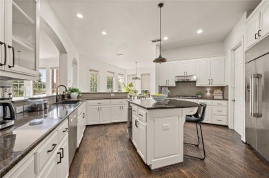 Welcome to this exquisite property! Nestled inside the on Hackberry Creek Country Club in Texas - for sale on GolfHomes.com, golf home, golf lot