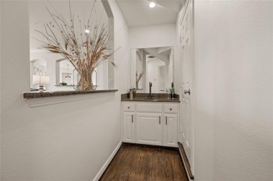 Welcome to this exquisite property! Nestled inside the on Hackberry Creek Country Club in Texas - for sale on GolfHomes.com, golf home, golf lot