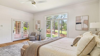 This stately all-brick home overlooking the 6th green of on The National Golf Club in North Carolina - for sale on GolfHomes.com, golf home, golf lot