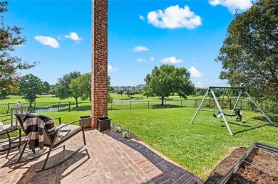Welcome to this exquisite property! Nestled inside the on Hackberry Creek Country Club in Texas - for sale on GolfHomes.com, golf home, golf lot