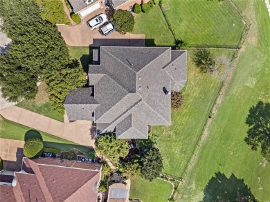 Welcome to this exquisite property! Nestled inside the on Hackberry Creek Country Club in Texas - for sale on GolfHomes.com, golf home, golf lot