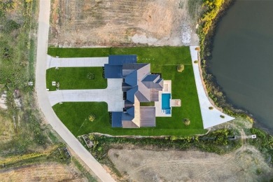 Welcome to an architectural triumph in Bartonville's prestigious on Lantana Golf Club in Texas - for sale on GolfHomes.com, golf home, golf lot