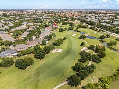Welcome to this exquisite property! Nestled inside the on Hackberry Creek Country Club in Texas - for sale on GolfHomes.com, golf home, golf lot