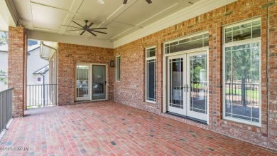 This stately all-brick home overlooking the 6th green of on The National Golf Club in North Carolina - for sale on GolfHomes.com, golf home, golf lot