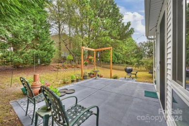 Charming 3-bedroom, 3-full bath home on a prime corner lot in on Highland Creek Golf Club in North Carolina - for sale on GolfHomes.com, golf home, golf lot