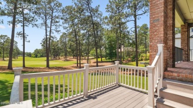 This stately all-brick home overlooking the 6th green of on The National Golf Club in North Carolina - for sale on GolfHomes.com, golf home, golf lot