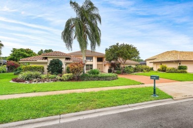 Spectacular golf course views from this 2-bedroom, 3.5-bath home on Boca Woods Country Club in Florida - for sale on GolfHomes.com, golf home, golf lot
