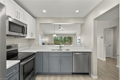 STUNNING LAKE & GOLF COURSE VIEWS! This light & bright 2 bedroom on Royal Wood Golf and Country Club in Florida - for sale on GolfHomes.com, golf home, golf lot