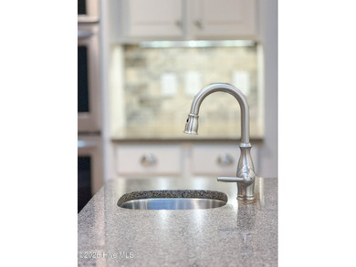 Welcome home to this beautifully maintained 4-bedroom, 4-bath on Compass Pointe Golf Course in North Carolina - for sale on GolfHomes.com, golf home, golf lot