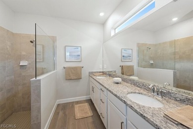 Better than new! This 4 bedroom, 3 bath waterfront front home on River Hall Country Club in Florida - for sale on GolfHomes.com, golf home, golf lot