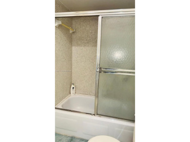Beautiful 2 Bedroom, 2 bath, first floor condo unit located in on Sunrise Lakes Phase III in Florida - for sale on GolfHomes.com, golf home, golf lot
