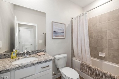 Better than new! This 4 bedroom, 3 bath waterfront front home on River Hall Country Club in Florida - for sale on GolfHomes.com, golf home, golf lot