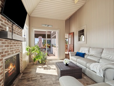 Experience refined waterfront living on Lake Wawasee in this on Wawasee Golf Club in Indiana - for sale on GolfHomes.com, golf home, golf lot