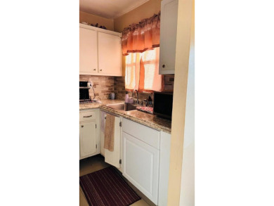 Beautiful 2 Bedroom, 2 bath, first floor condo unit located in on Sunrise Lakes Phase III in Florida - for sale on GolfHomes.com, golf home, golf lot