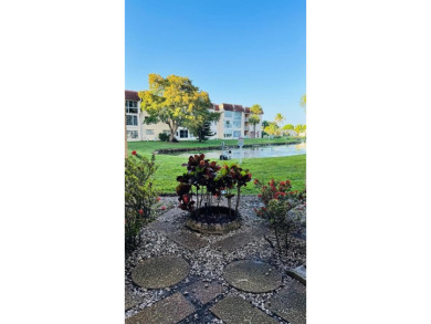 Beautiful 2 Bedroom, 2 bath, first floor condo unit located in on Sunrise Lakes Phase III in Florida - for sale on GolfHomes.com, golf home, golf lot