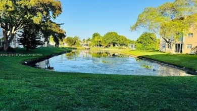 Beautiful 2 Bedroom, 2 bath, first floor condo unit located in on Sunrise Lakes Phase III in Florida - for sale on GolfHomes.com, golf home, golf lot