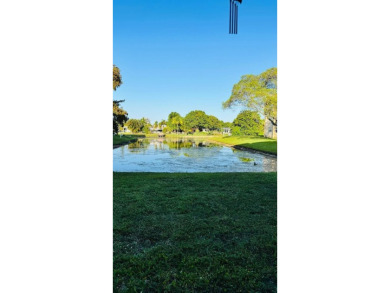 Beautiful 2 Bedroom, 2 bath, first floor condo unit located in on Sunrise Lakes Phase III in Florida - for sale on GolfHomes.com, golf home, golf lot