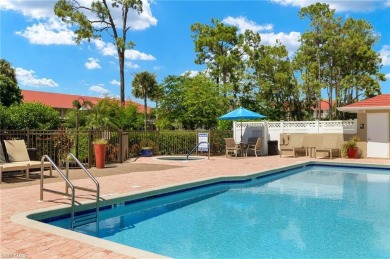 STUNNING LAKE & GOLF COURSE VIEWS! This light & bright 2 bedroom on Royal Wood Golf and Country Club in Florida - for sale on GolfHomes.com, golf home, golf lot