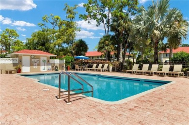 STUNNING LAKE & GOLF COURSE VIEWS! This light & bright 2 bedroom on Royal Wood Golf and Country Club in Florida - for sale on GolfHomes.com, golf home, golf lot