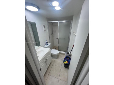 Beautiful 2/2 waterfront condo in the quiet Pine Island Ridge! on Pine Island Ridge Country Club in Florida - for sale on GolfHomes.com, golf home, golf lot