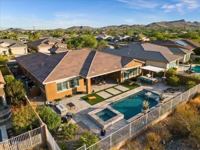 This stunning 5-bedroom, 4-bathroom home is a true gem, offering on Estrella Mountain Ranch Golf Course in Arizona - for sale on GolfHomes.com, golf home, golf lot