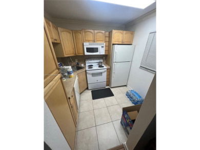 Beautiful 2/2 waterfront condo in the quiet Pine Island Ridge! on Pine Island Ridge Country Club in Florida - for sale on GolfHomes.com, golf home, golf lot