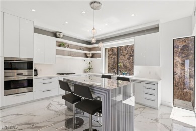 Experience sweeping Strip and mountain views from this elegant on Dragon Ridge Country Club in Nevada - for sale on GolfHomes.com, golf home, golf lot