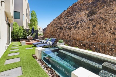 Experience sweeping Strip and mountain views from this elegant on Dragon Ridge Country Club in Nevada - for sale on GolfHomes.com, golf home, golf lot