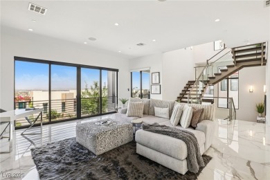 Experience sweeping Strip and mountain views from this elegant on Dragon Ridge Country Club in Nevada - for sale on GolfHomes.com, golf home, golf lot