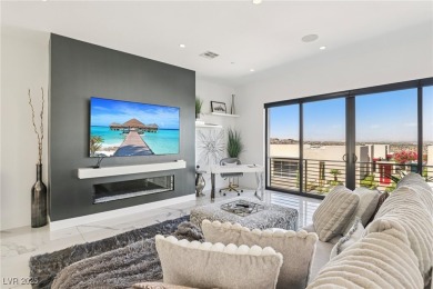 Experience sweeping Strip and mountain views from this elegant on Dragon Ridge Country Club in Nevada - for sale on GolfHomes.com, golf home, golf lot