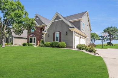 Overlooking the #1 hole of Falcon Ridge Golf Course, this grand on Falcon Ridge Golf Course in Kansas - for sale on GolfHomes.com, golf home, golf lot