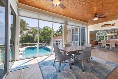 Welcome to your exclusive waterfront retreat, a resilient haven on Longboat Key Golf Club in Florida - for sale on GolfHomes.com, golf home, golf lot