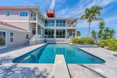 Welcome to your exclusive waterfront retreat, a resilient haven on Longboat Key Golf Club in Florida - for sale on GolfHomes.com, golf home, golf lot