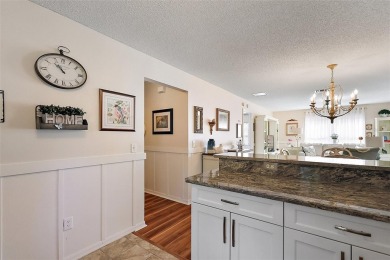 GORGEOUS, TURNKEY 2/2 Loredo with ENCLOSED, CLIMATE-CONTROLLED on The Links of Spruce Creek in Florida - for sale on GolfHomes.com, golf home, golf lot