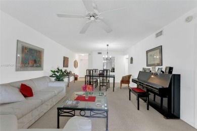 Experience effortless elegance in this first-floor 2-bedroom on Sunrise Lakes Phase IV Golf Course in Florida - for sale on GolfHomes.com, golf home, golf lot