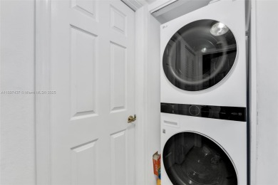 Experience effortless elegance in this first-floor 2-bedroom on Sunrise Lakes Phase IV Golf Course in Florida - for sale on GolfHomes.com, golf home, golf lot