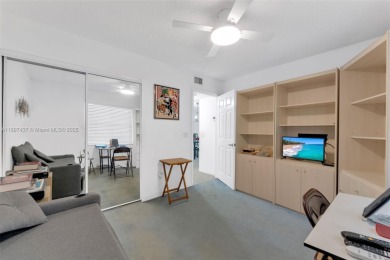 Experience effortless elegance in this first-floor 2-bedroom on Sunrise Lakes Phase IV Golf Course in Florida - for sale on GolfHomes.com, golf home, golf lot