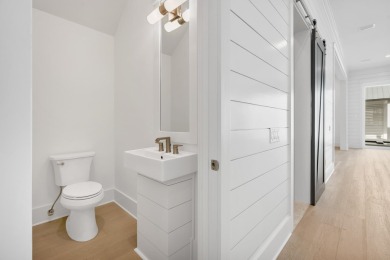 This exceptional Topsail Plan by Cole Construction offers luxury on Origins Golf Club in Florida - for sale on GolfHomes.com, golf home, golf lot